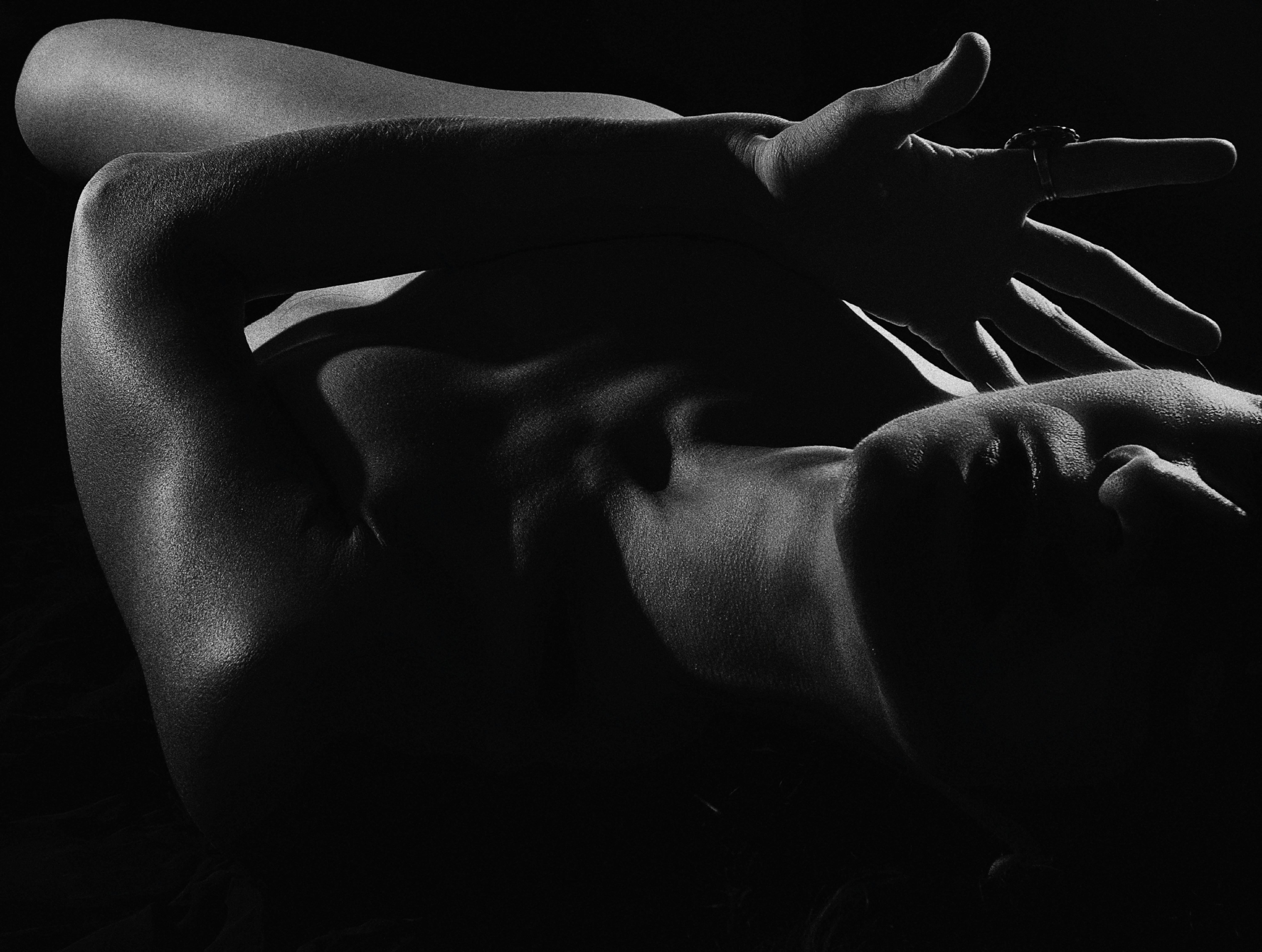 Naked Woman Lying in Dark · Free Stock Photo