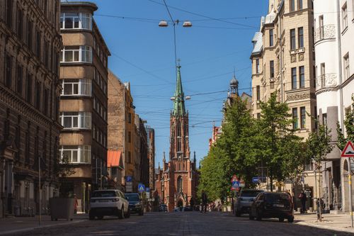 Free A picturesque street view of St. Gertrude Old Church in Riga, Latvia on a sunny day. Stock Photo