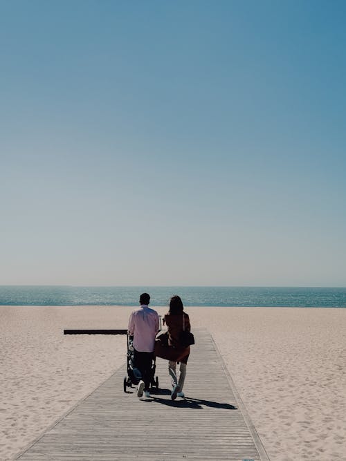 Couple Waking on Broadway Leading at Sea