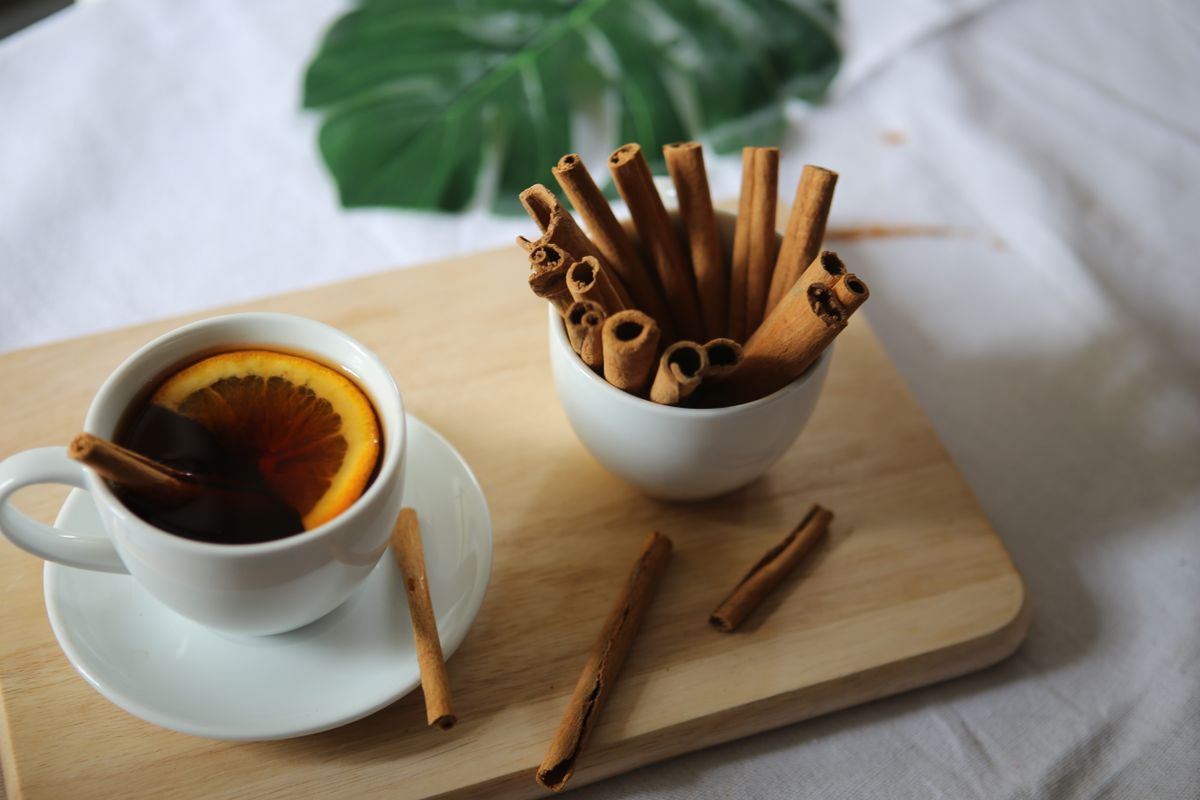 Warm herbal tea with spices, a traditional Ayurvedic approach to supporting digestion and balance