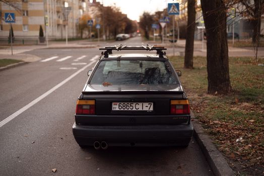 Rear view of a Volkswagen Jetta parked on an urban street in Minsk, Belarus.