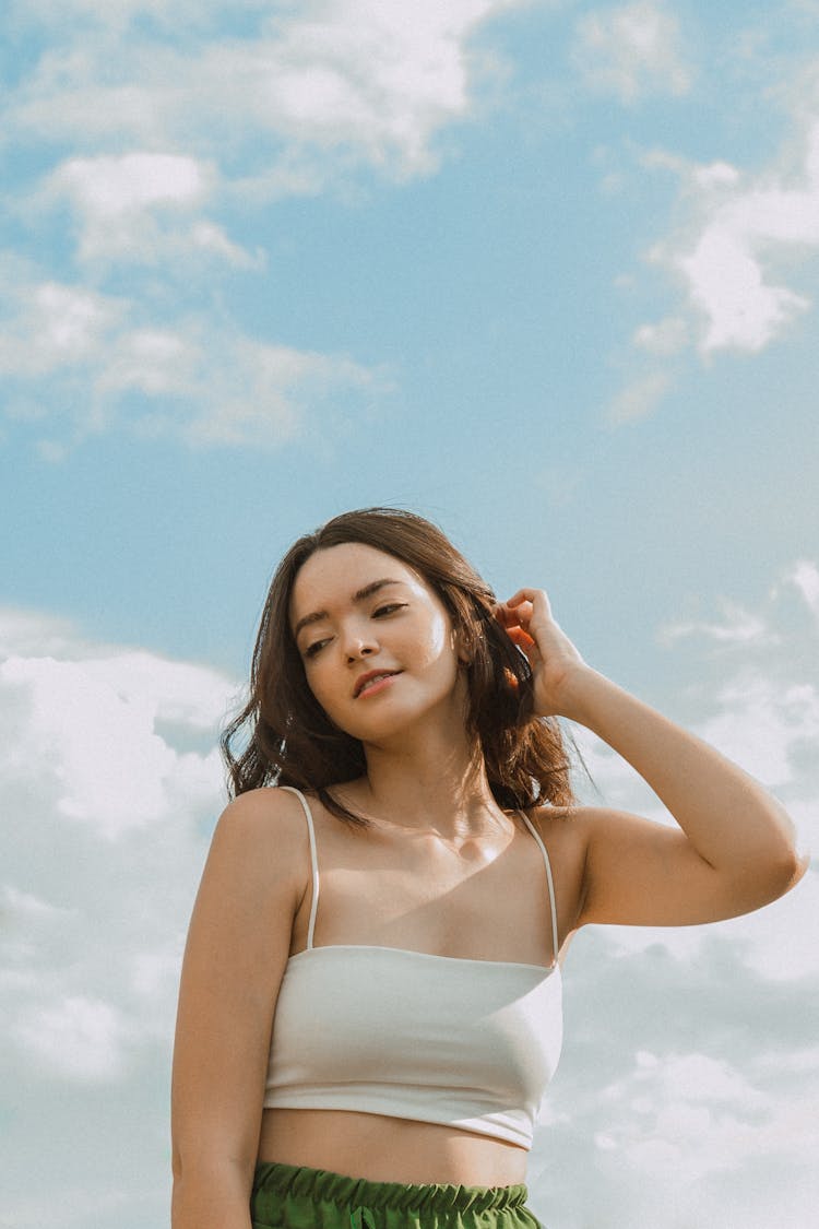 Portrait Of Woman In White Top