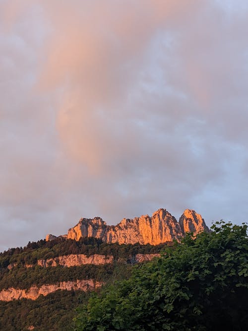 Clouds over Rock Formations at Sunset
