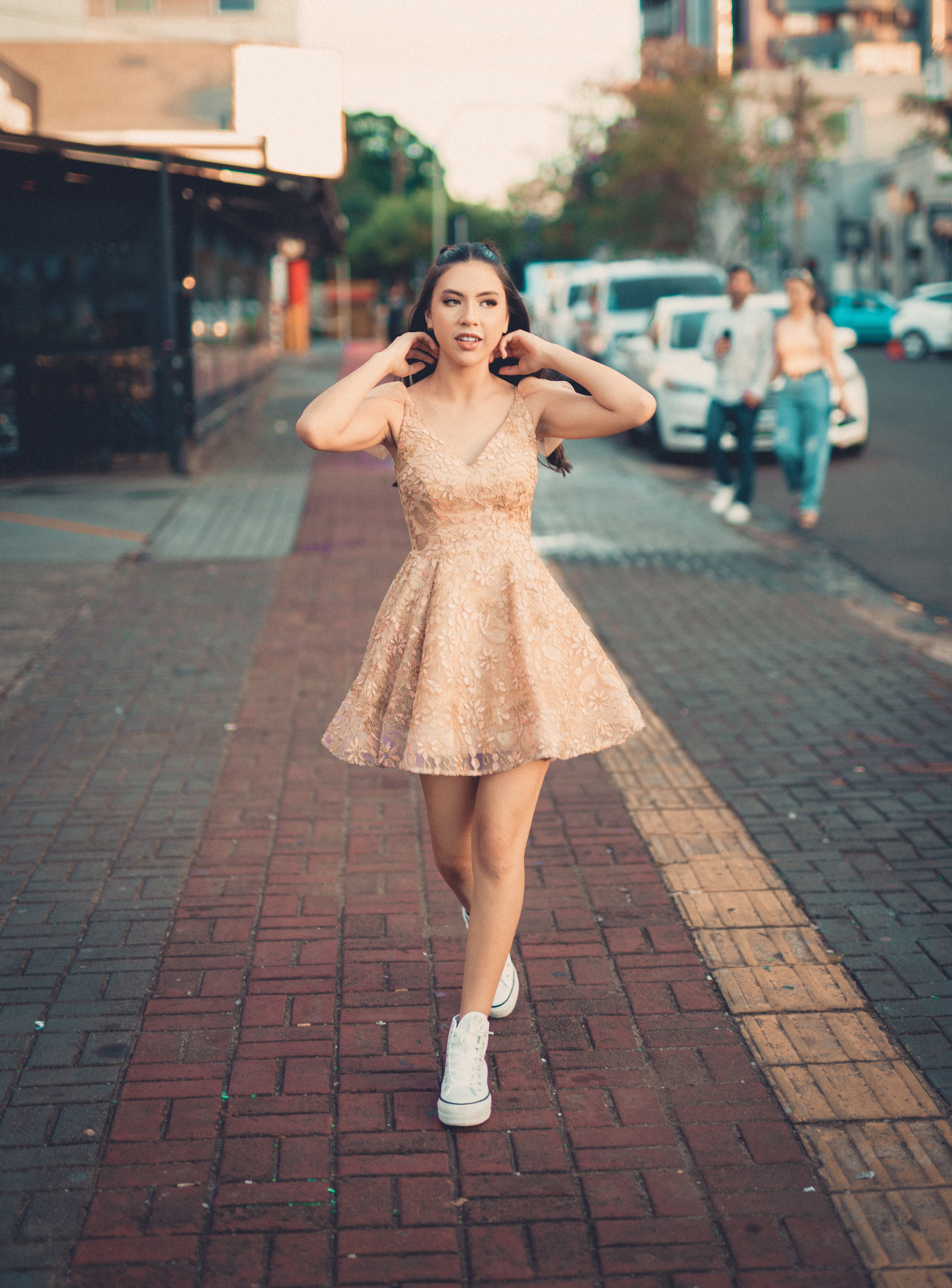 Young Woman in a Dress Walking on the Sidewalk Free Stock Photo Young Woman in a Dress Walking on the Sidewalk Free Stock Photo
