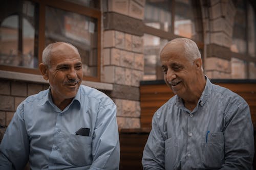 Smiling and Talking Elderly Men