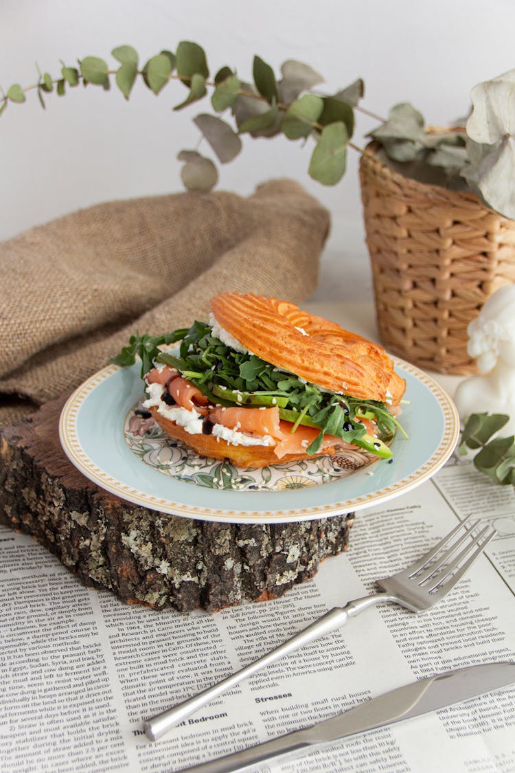 Food On Plate And Plant Behind