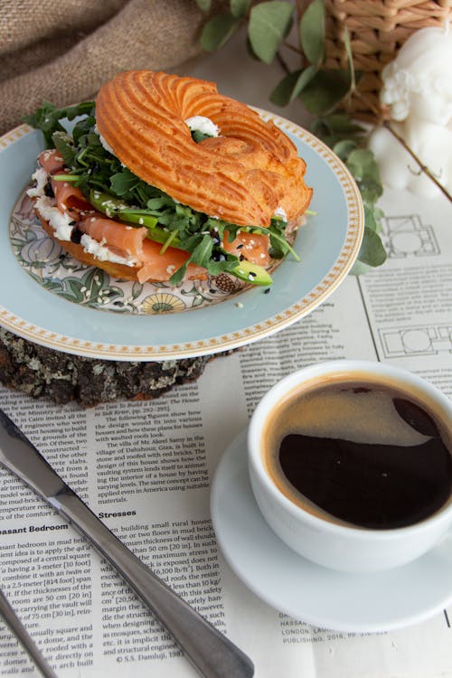 Free Bagel and Cup of Coffee Stock Photo