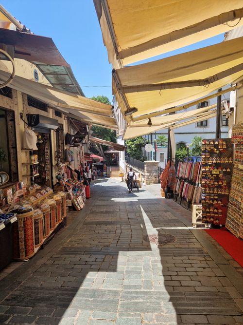 Free Explore the lively market street in Muratpaşa, Antalya with colorful shops and summer vibes. Stock Photo