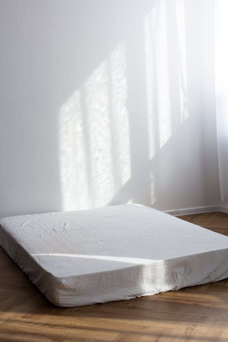 A Mattress In A Bedroom