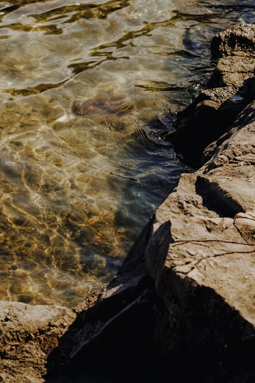Close-up of a Rocky Coast and Sea Water 