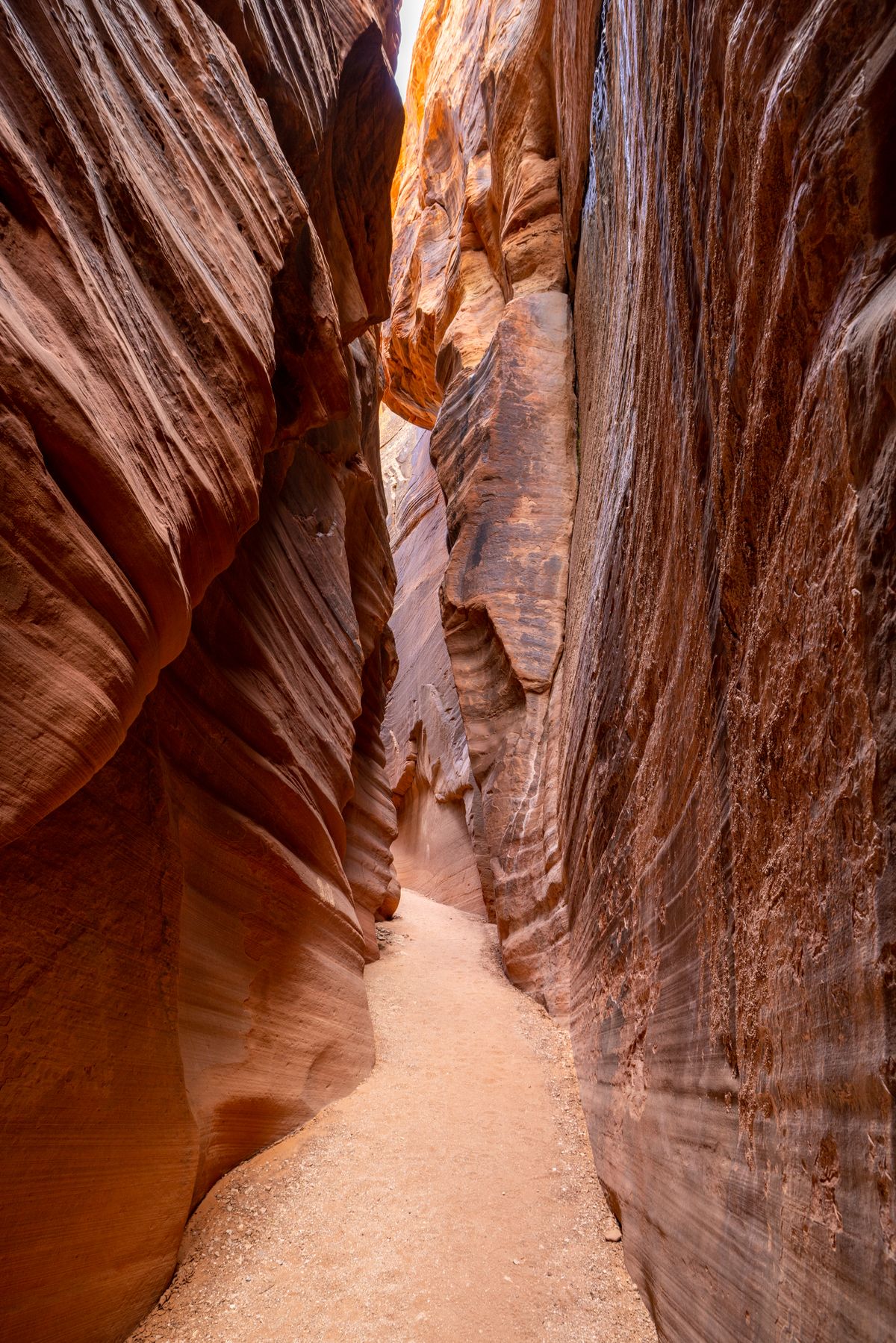 Slot canyon narrow passage hiker