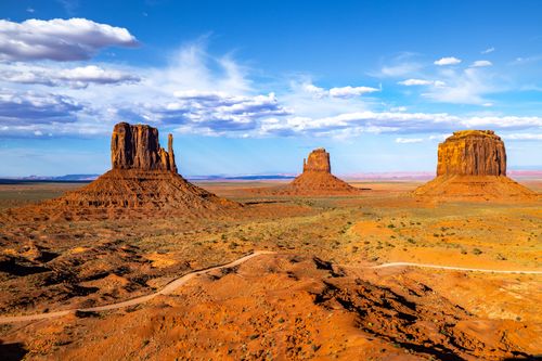 Free Explore the majestic buttes under a vivid blue sky in Monument Valley, Arizona. Stock Photo