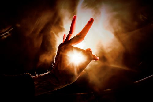 Free Hand Gesture Lighted Upon on Stock Photo
