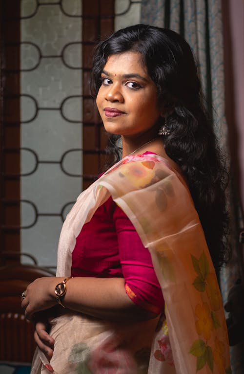 Portrait of a Young Indian Woman in Traditional Sari 
