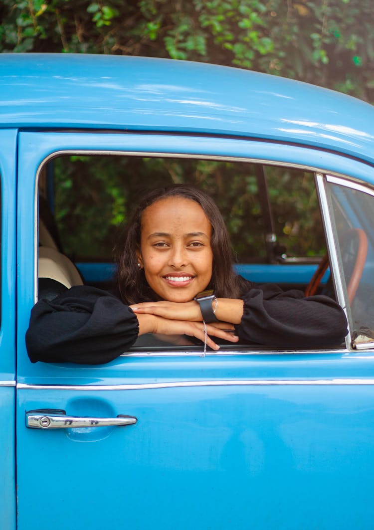 Woman In Car Window