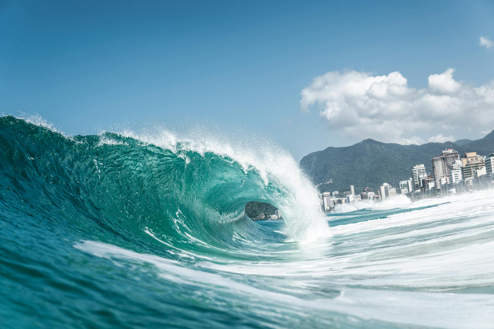 Wave with a Foam in a Turquoise Sea