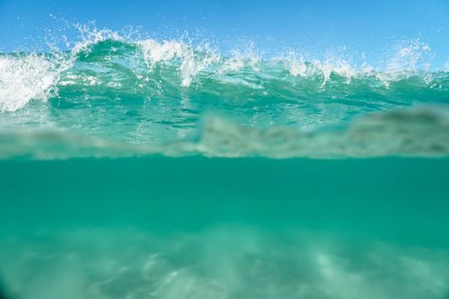 Free Captivating turquoise wave captured in Rio de Janeiro, showcasing the crystalline water and dynamic motion. Stock Photo