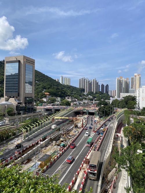 Free Busy Streets and a View of Hong Kong Skyscrapers in the Background, China  Stock Photo