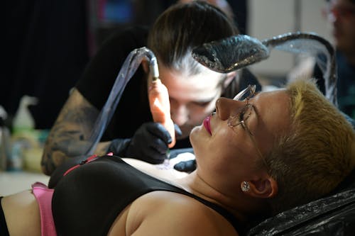 A Woman Getting a Tattoo 