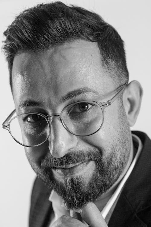 Black and White Portrait of a Bearded Man in Eyeglasses 