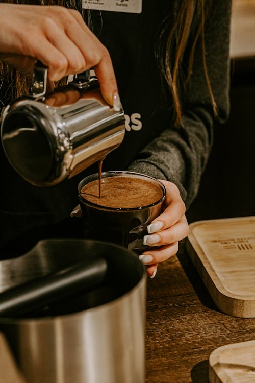 Woman Hands Pouring Coffee