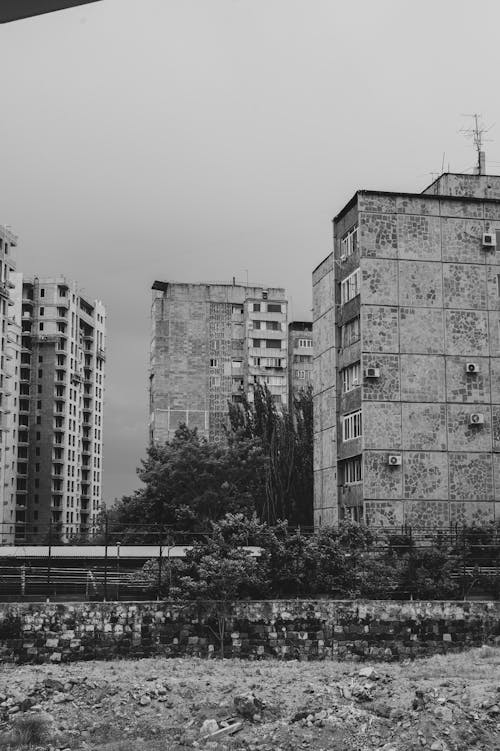 Black and White Photo of Apartment Blocks in City 
