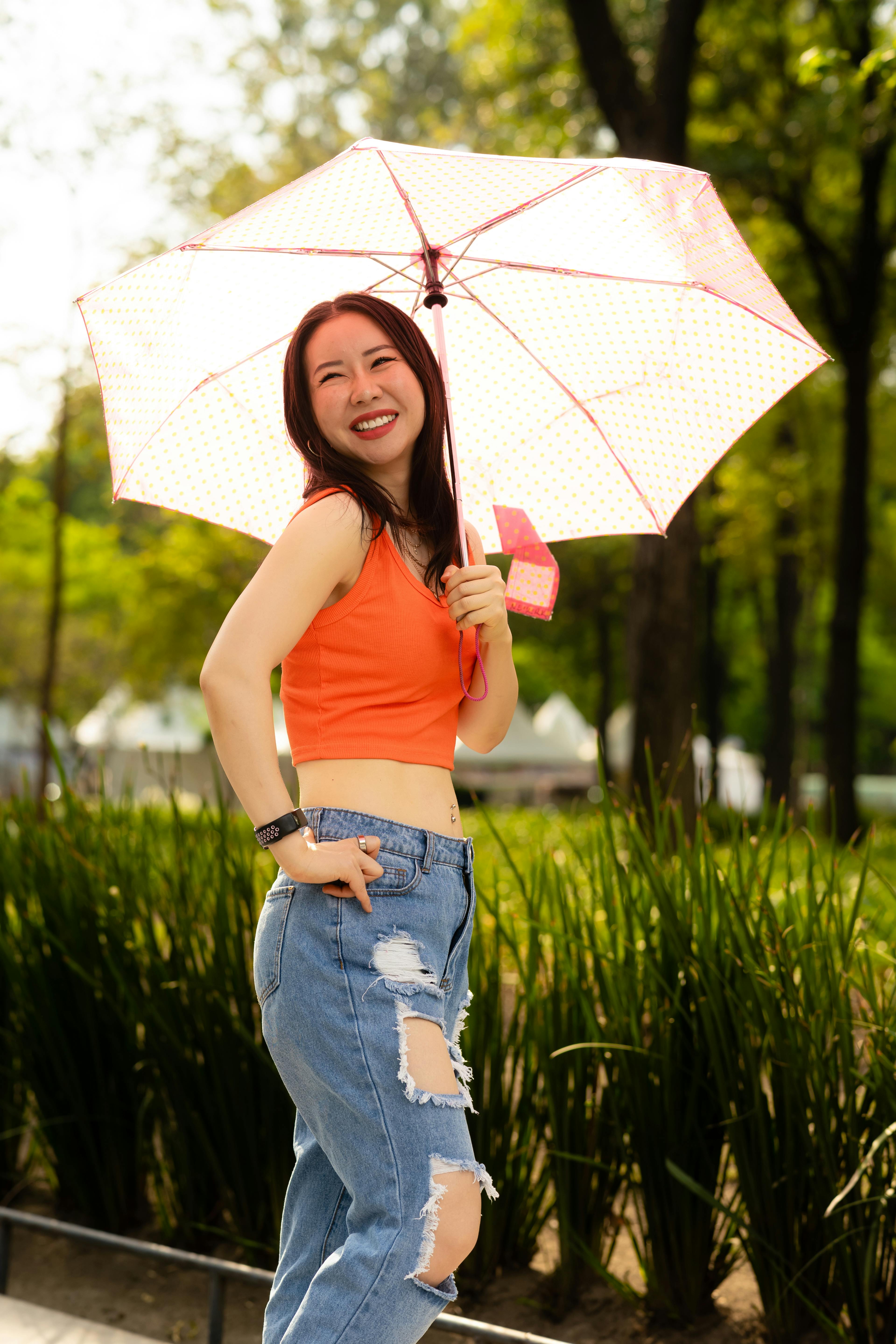 happy young asian woman visiting the streets of mexico city