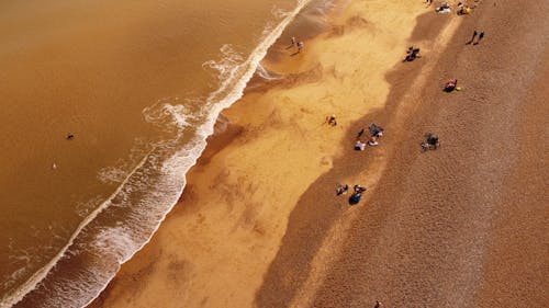 Ilmainen kuvapankkikuva tunnisteilla droonimateriaali, hiekka, ihmiset