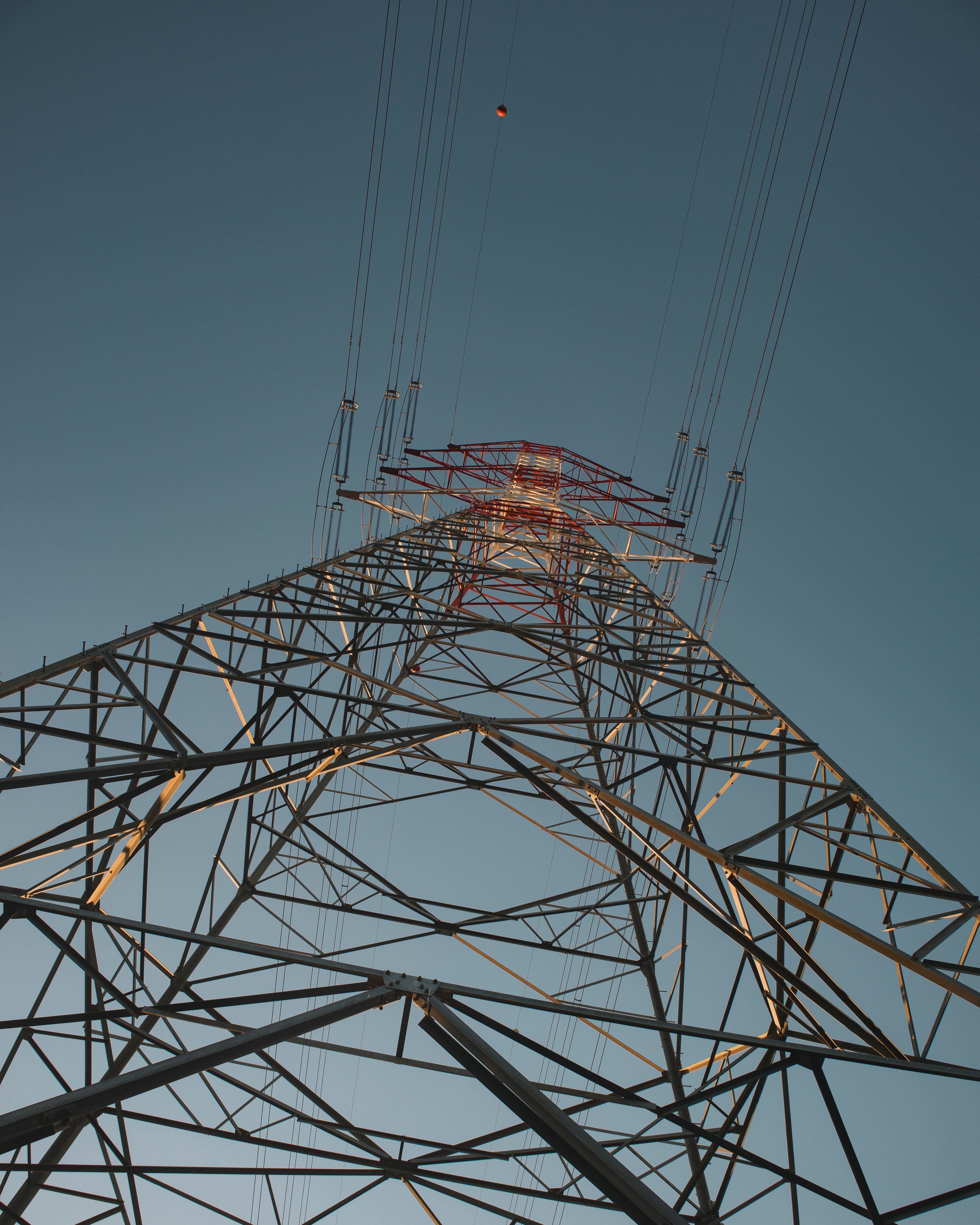 Low Angle Shot of an Electricity Tower · Free Stock Photo