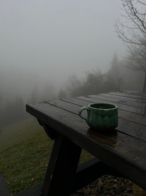 Free A Mug on a Wooden Table Outside  Stock Photo