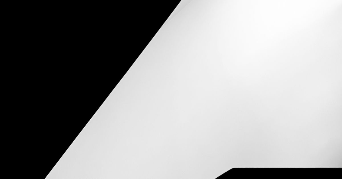 White Triangle Shape Design White Triangle Shape against Black Background · Free Stock Photo