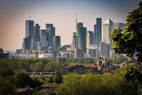 Free Modern architecture and urban skyline of London with prominent skyscrapers on a sunny day. Stock Photo