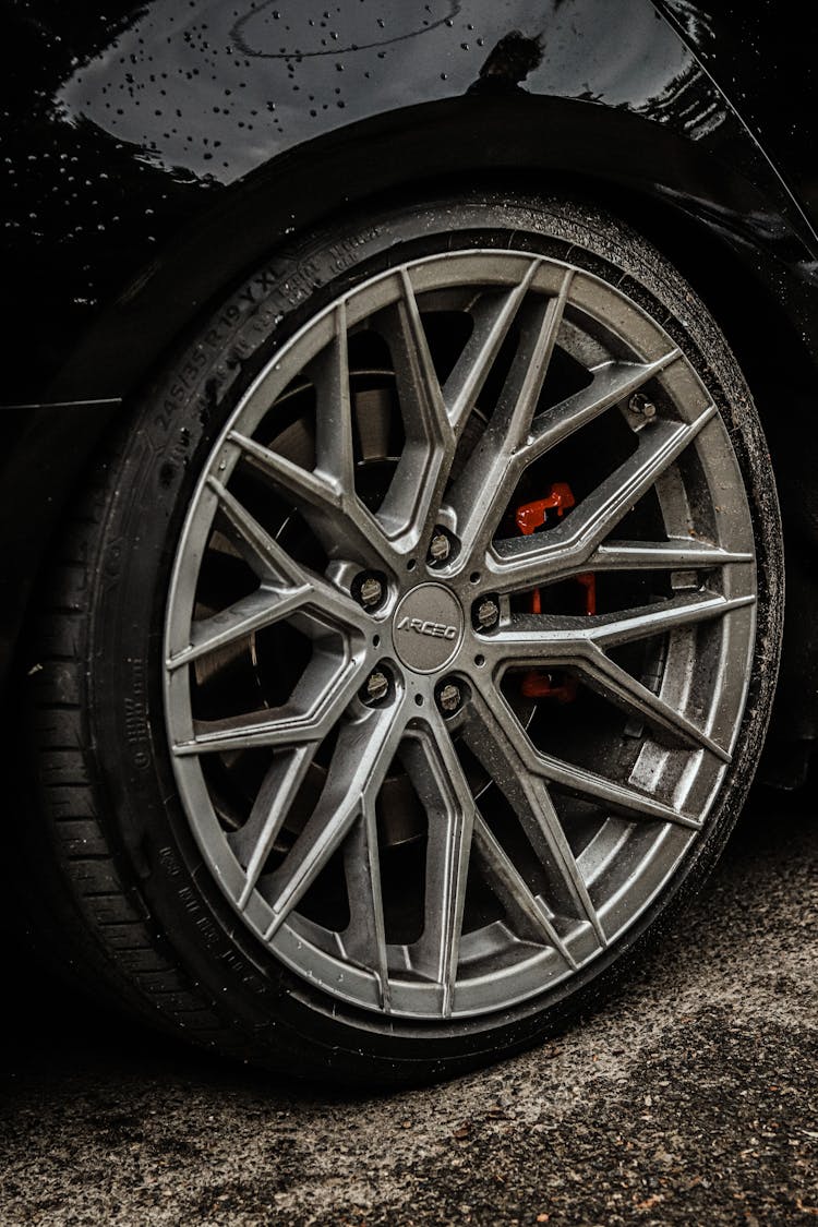 Close Up Of Black Car Wheel