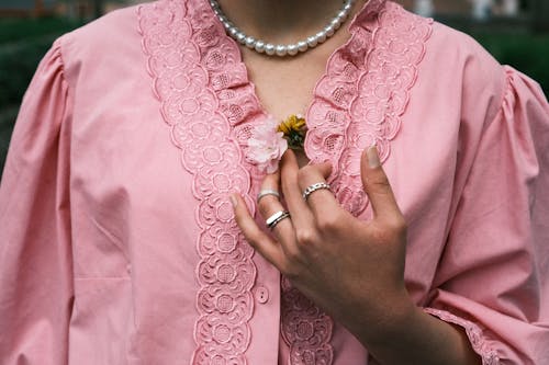 Woman with a Flower in her Blouse