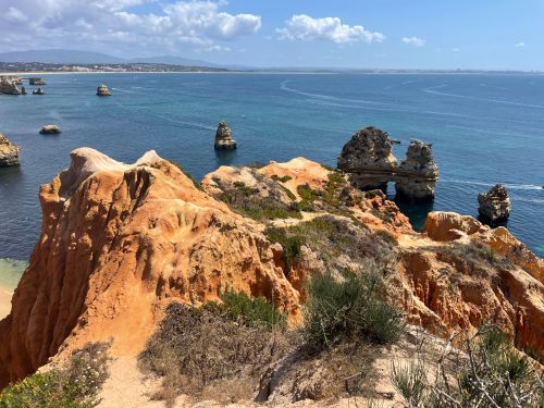 Free Discover the breathtaking cliffs and rock formations at Praia do Camilo in the Algarve, Portugal. Stock Photo