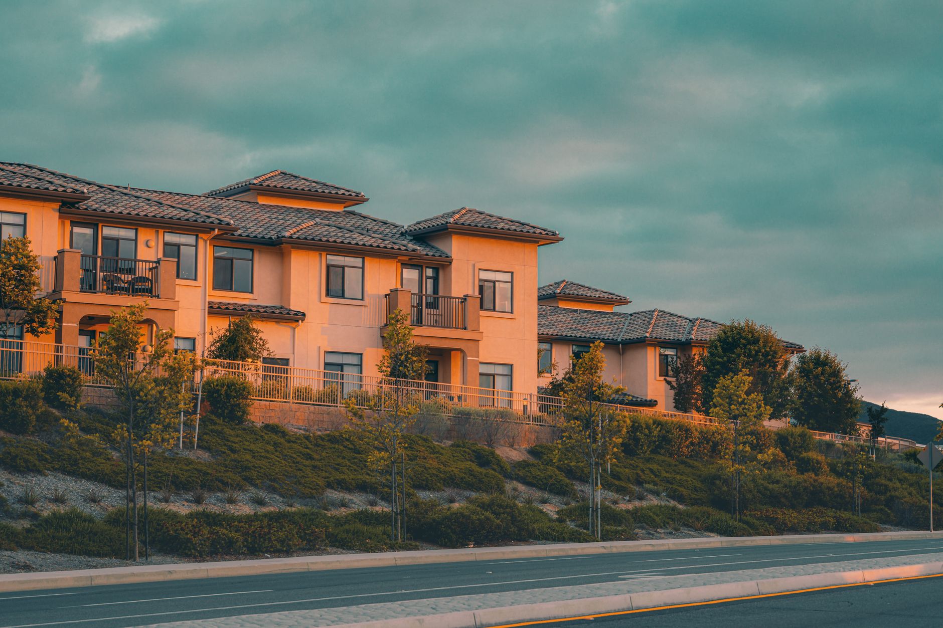 Contemporary upscale residential buildings in Temecula, CA, captured at sunset.