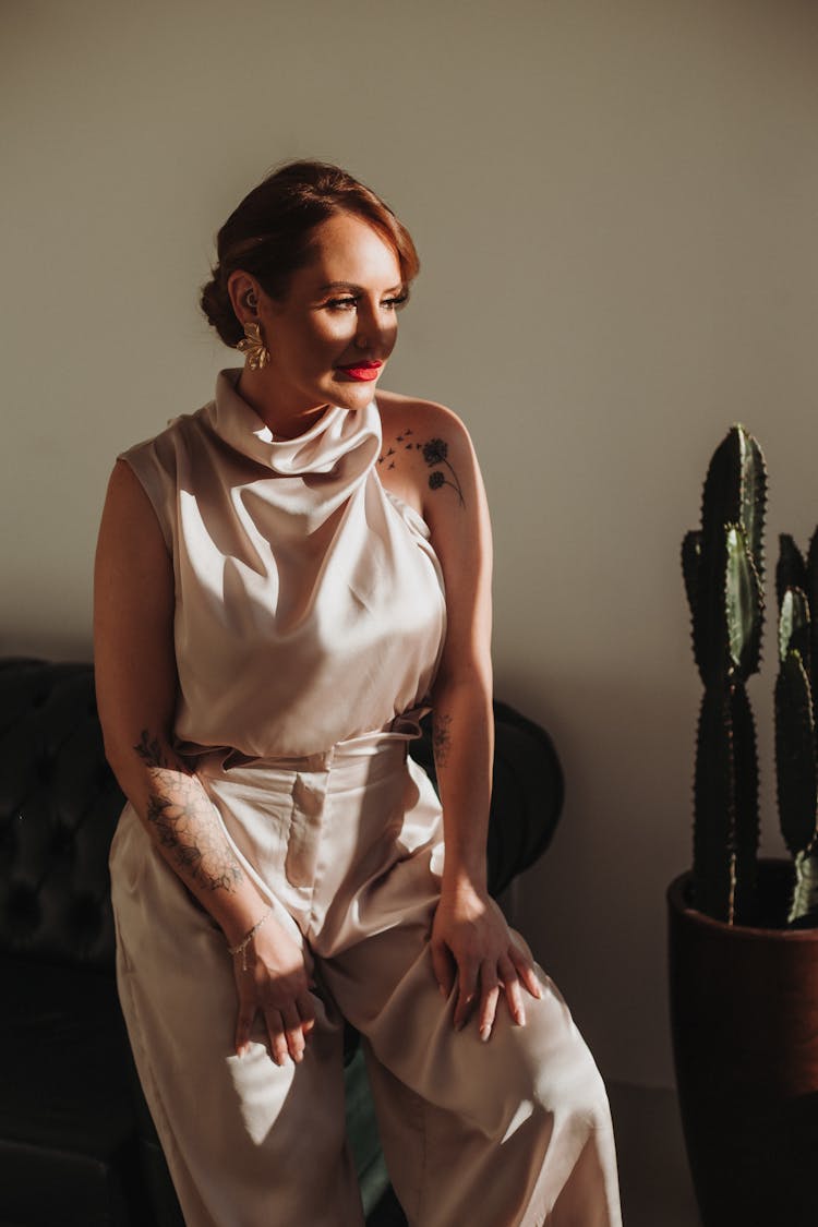 Woman In An Elegant Blouse And Pants 