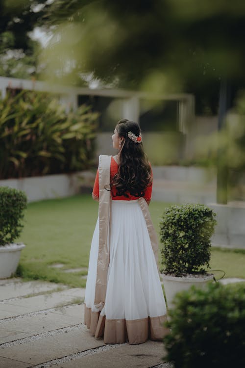 Woman in Dress in Garden