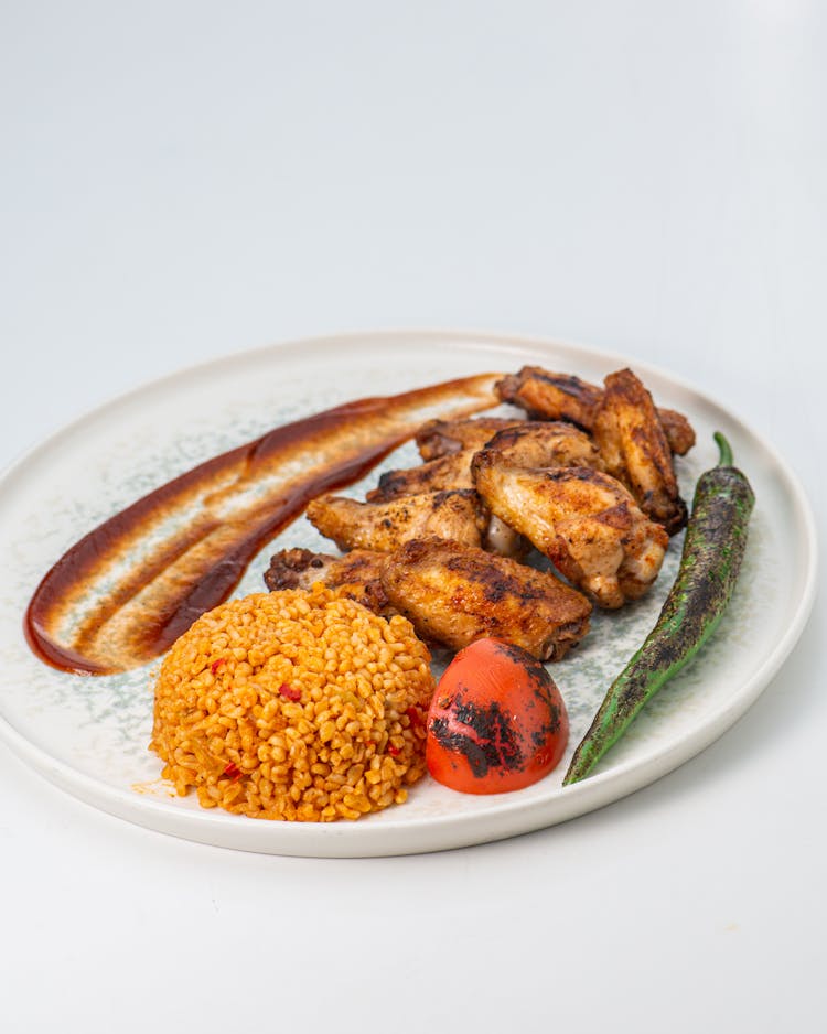 Chicken Dish With Yellow Rice And Roasted Vegetables