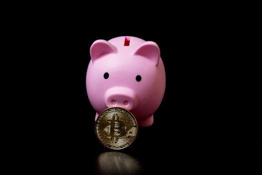 Pink piggy bank holding a bitcoin coin symbolizing modern digital investments.