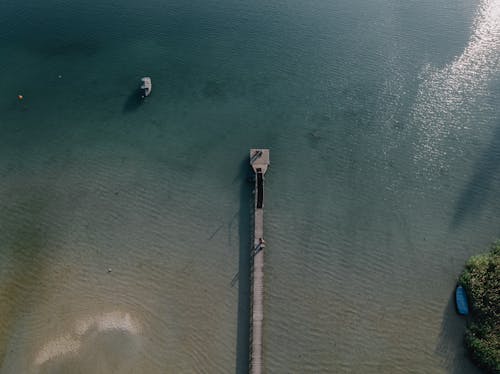 Pier on Sunlit Sea Shore