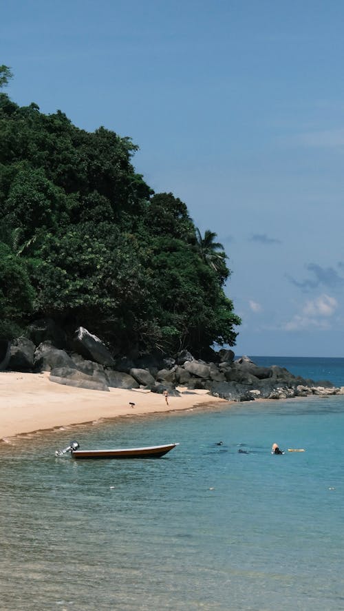 Boat in Water near Seashore