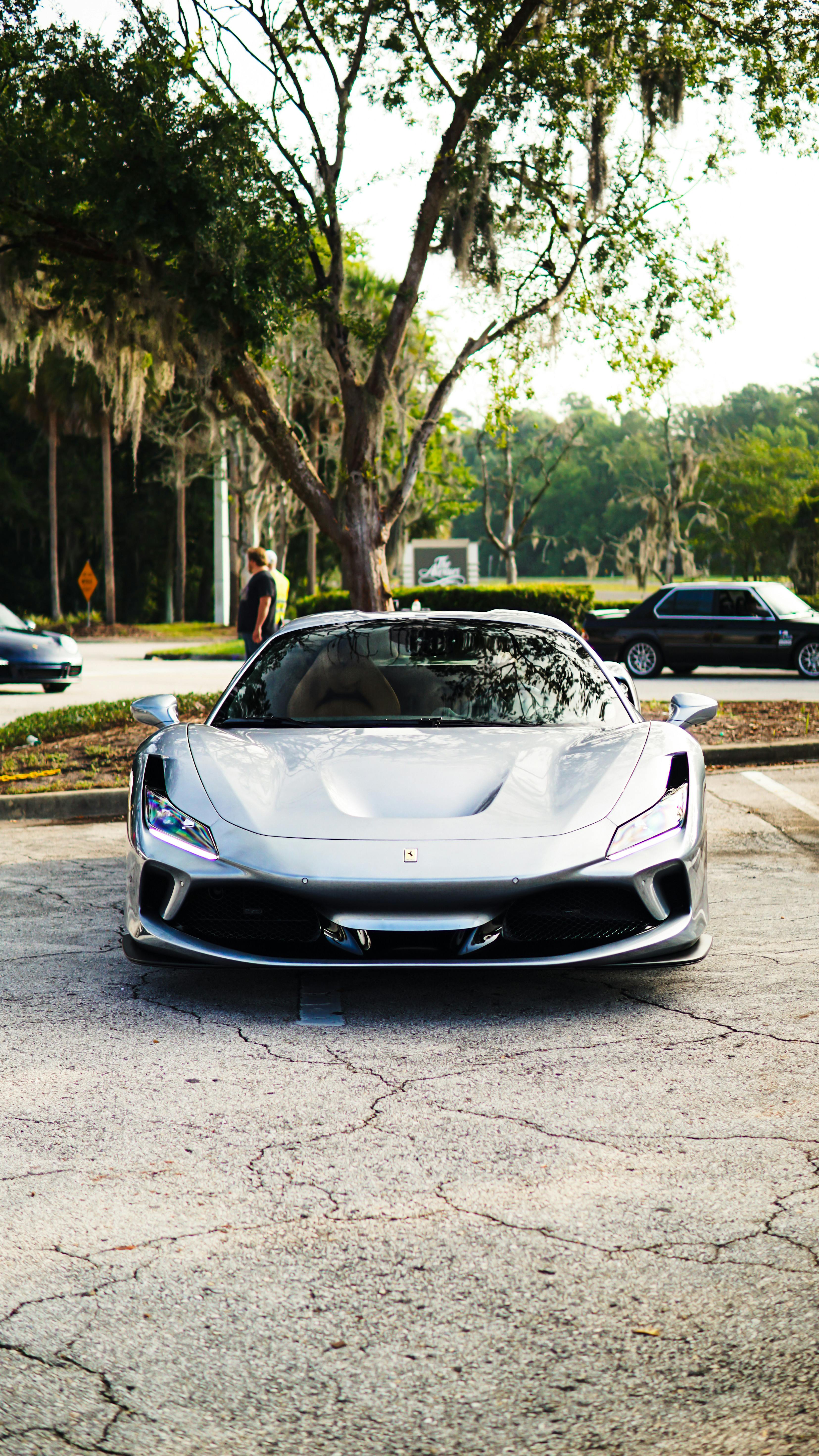 Sports Car on a Parking Lot · Free Stock Photo