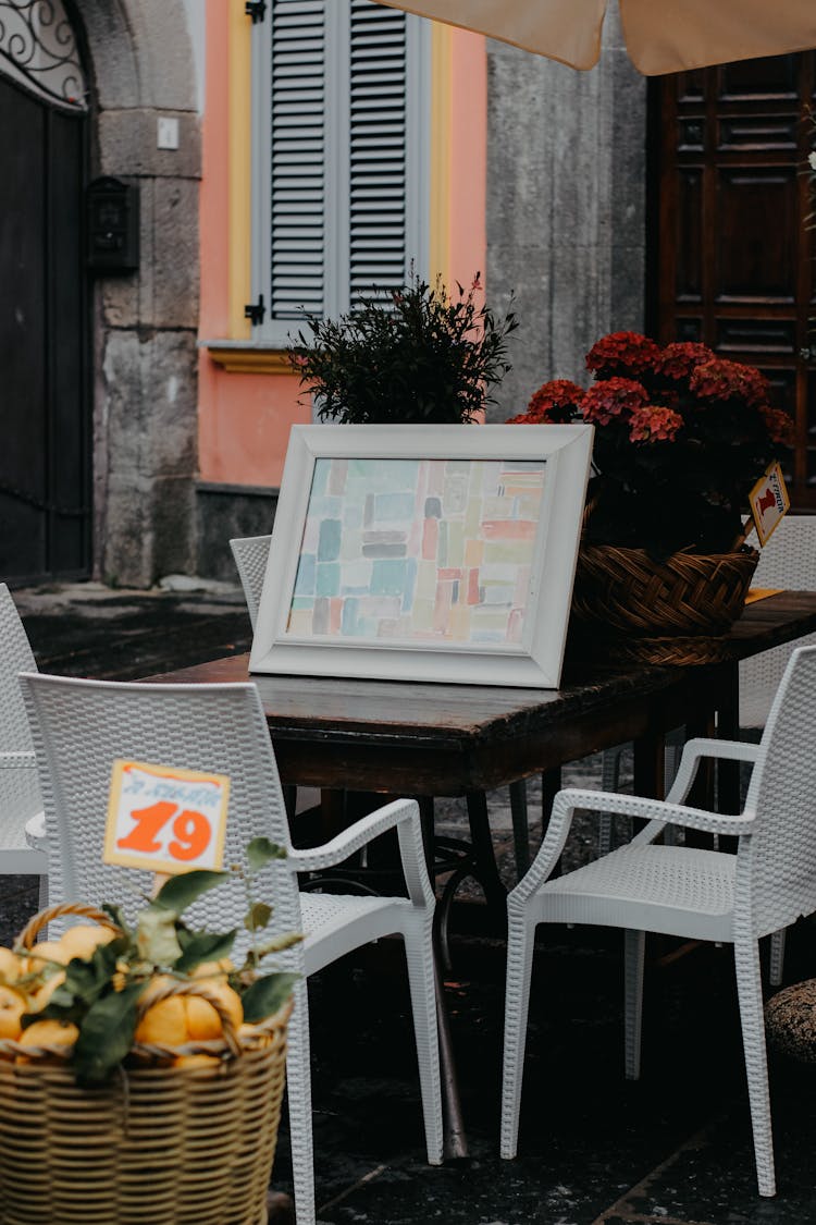 White Chairs Around Table