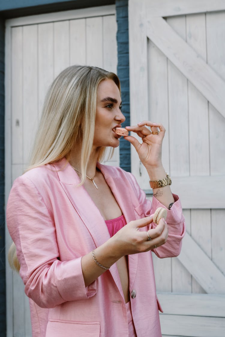 Blonde Woman Eating Cookies