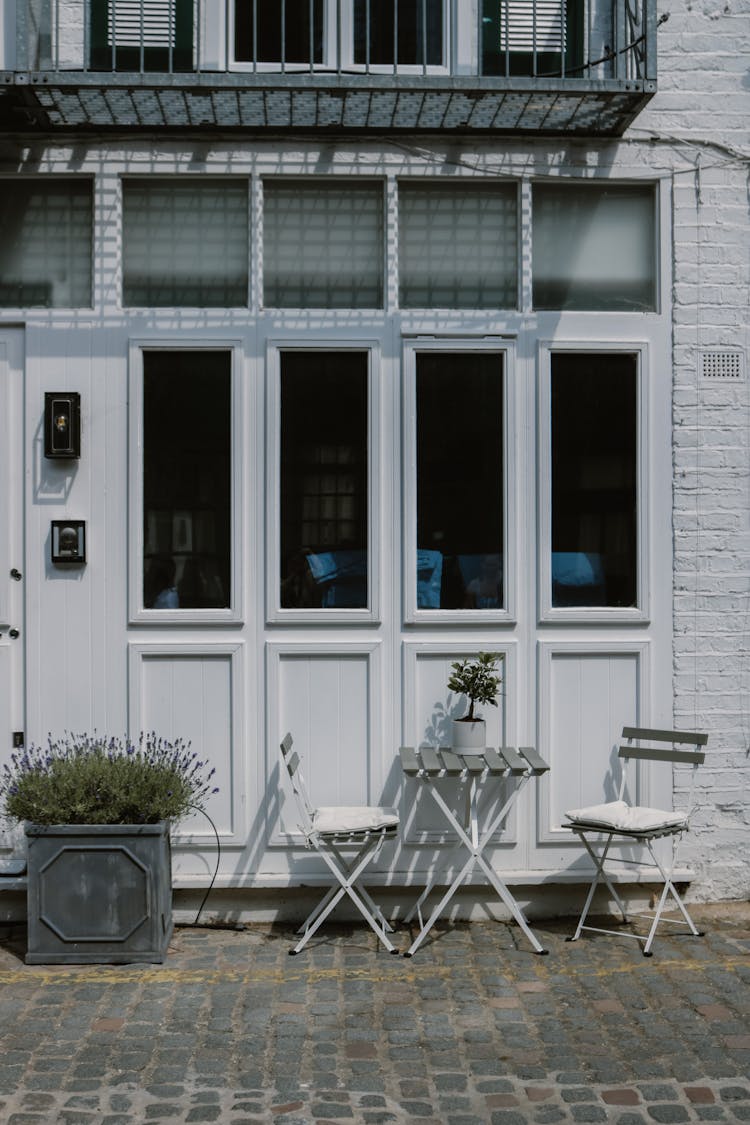 Windows In White Building Near Pavement