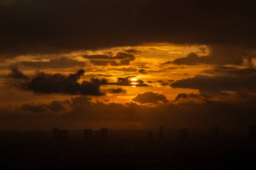Бесплатное стоковое фото с воздух, желтое небо, закат