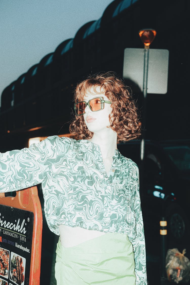 Woman Posing In Sunglasses