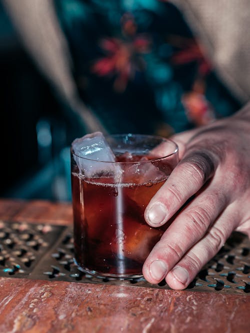 Hand Holding a Cold Drink 