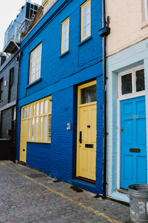 Blue Walls of Houses near Street